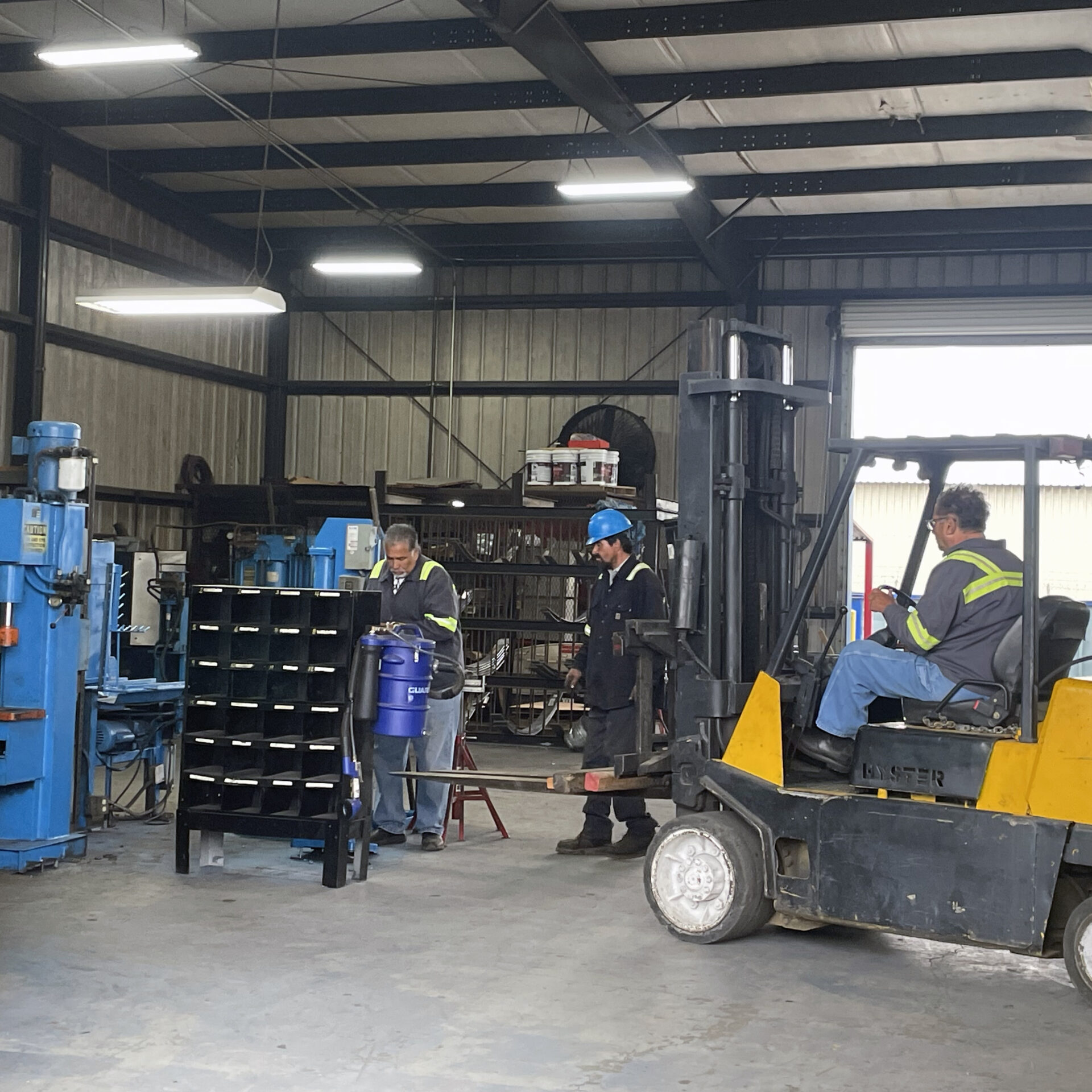 Installing press work machines in Fontana repair shop